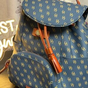 New without tags. Dooney and Bourke large Gretta Backpack and wallet